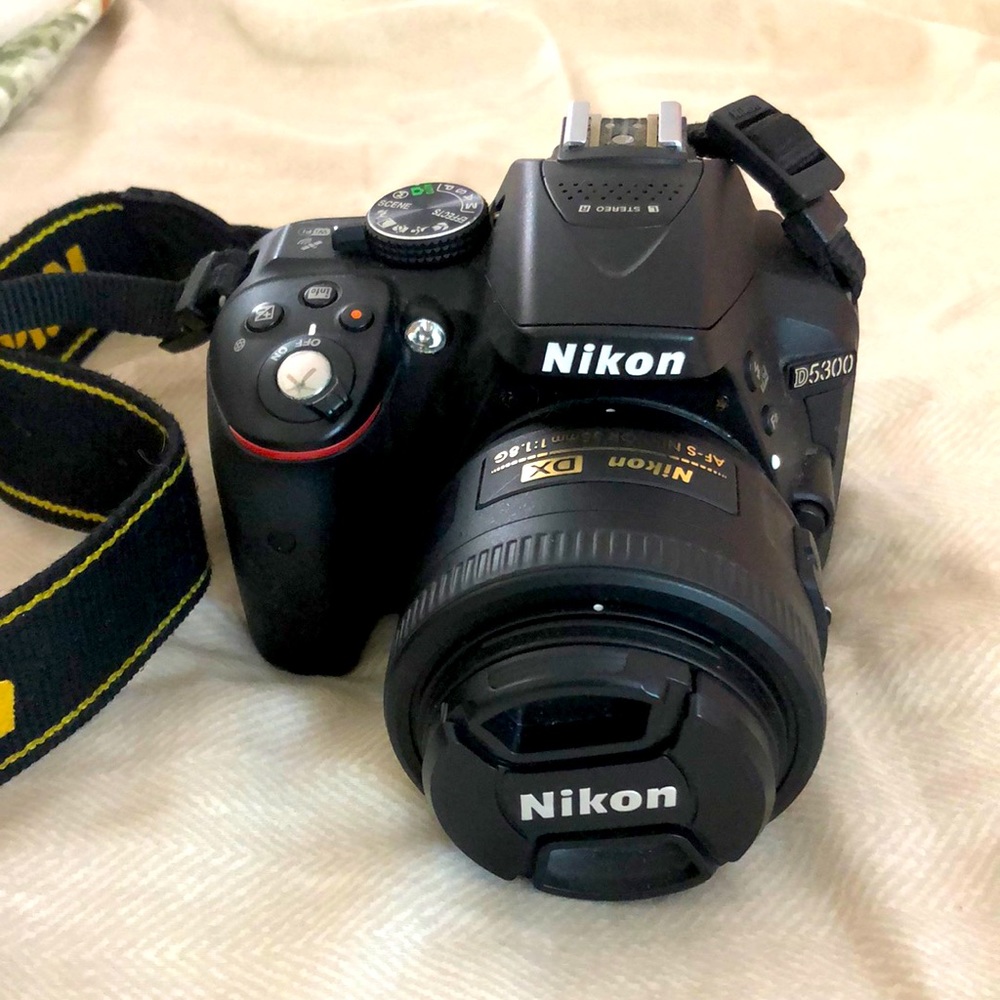 Nikon D5300 with 35mm lens, cap & carrying case
